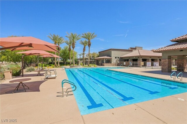 3904 Redbreast Ln, North Las Vegas, NV 89084 - community pool featuring a patio