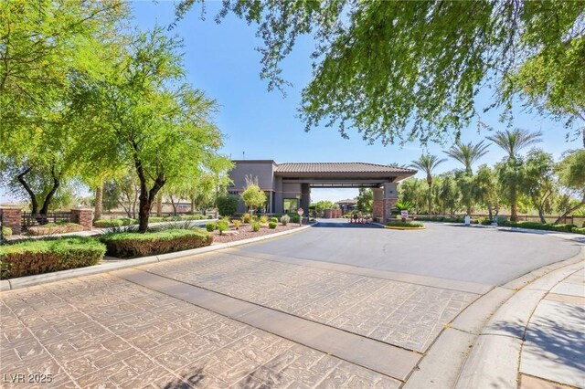 3904 Redbreast Ln, North Las Vegas, NV 89084 - view of road with a gated entry and curbs
