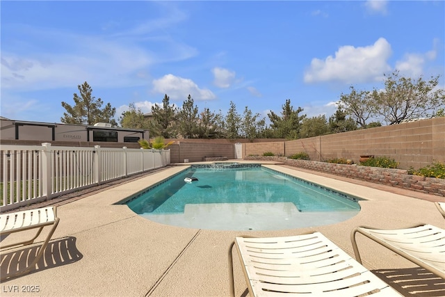 view of swimming pool featuring a fenced in pool, a patio, and a fenced backyard