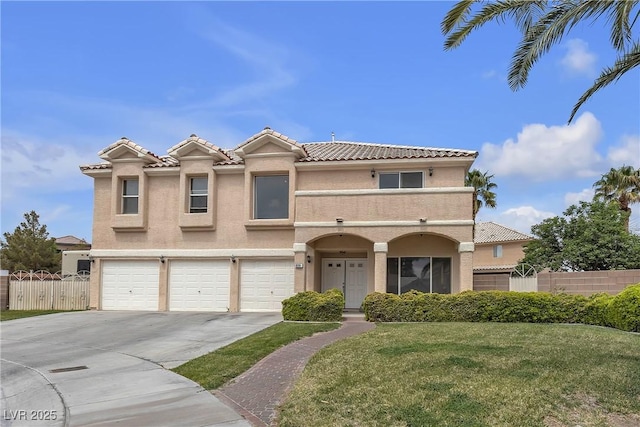 view of front of home featuring a tile roof, concrete driveway, a front lawn, fence, and stucco siding