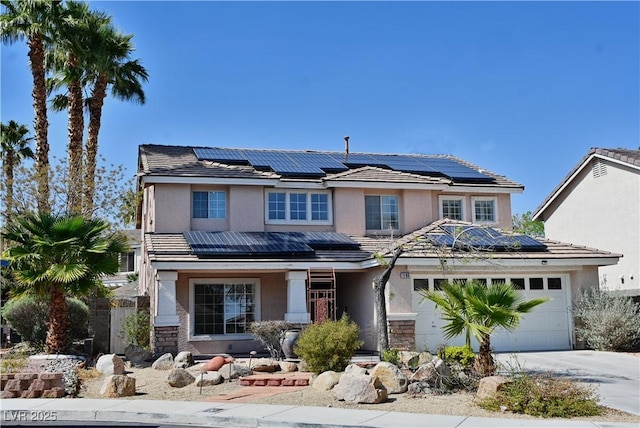 1105 Enderly Ln, Las Vegas, NV 89144 - traditional-style home with roof mounted solar panels, stucco siding, and driveway