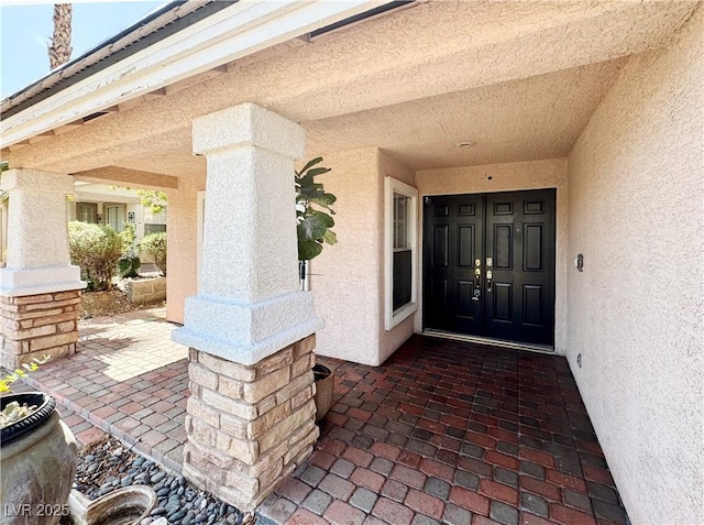 1105 Enderly Ln, Las Vegas, NV 89144 - doorway to property with stucco siding