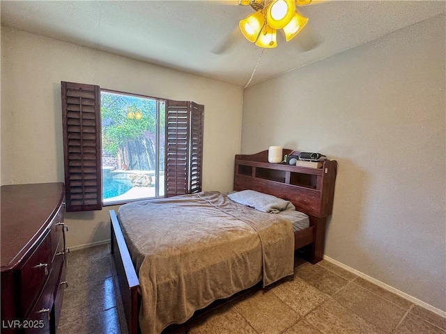 1105 Enderly Ln, Las Vegas, NV 89144 - bedroom featuring baseboards and a ceiling fan