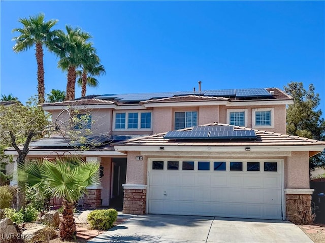 1105 Enderly Ln, Las Vegas, NV 89144 - traditional-style house featuring solar panels, stone siding, driveway, stucco siding, and a tile roof