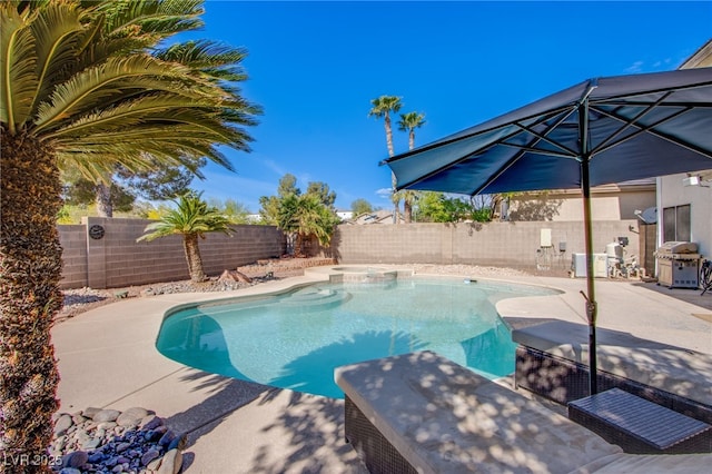 view of pool with a fenced in pool, a fenced backyard, a patio area, and a grill