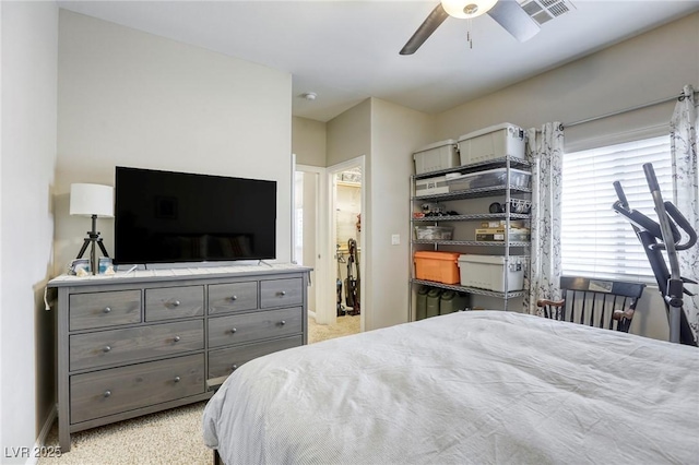 bedroom featuring visible vents, a ceiling fan, and baseboards