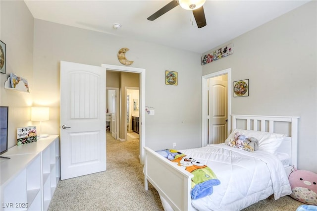 bedroom with light colored carpet and a ceiling fan