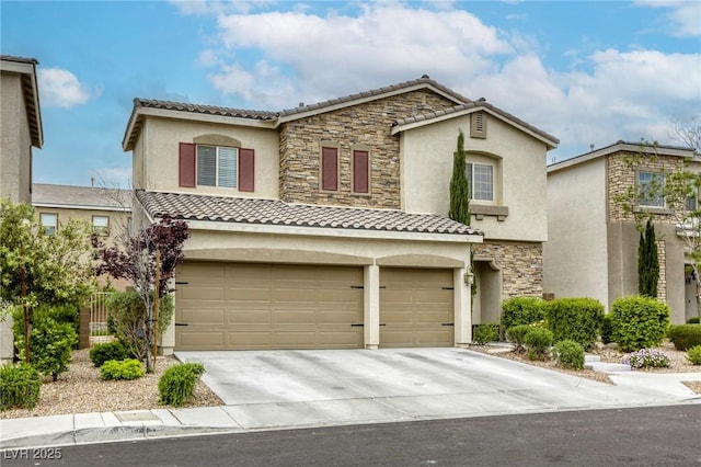 mediterranean / spanish home with stucco siding, a tiled roof, and stone siding