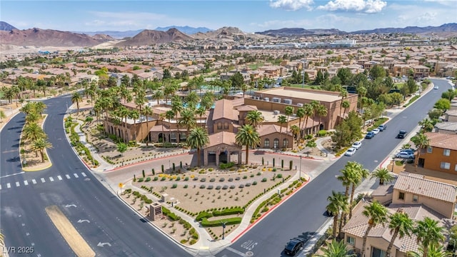 aerial view with a mountain view and a residential view