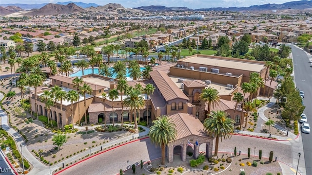 birds eye view of property with a residential view and a mountain view