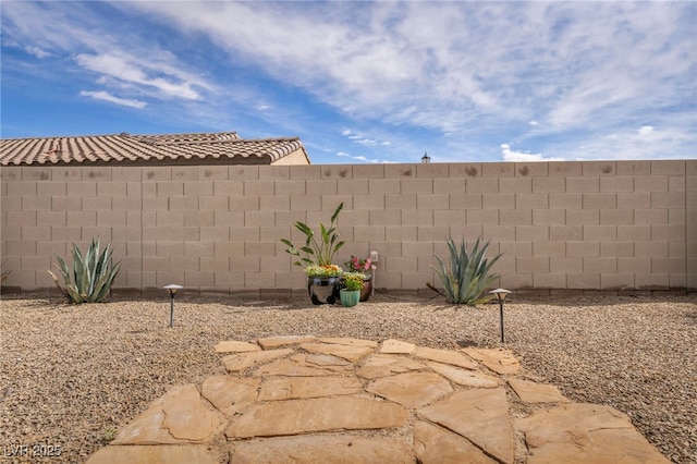 view of yard featuring a fenced backyard