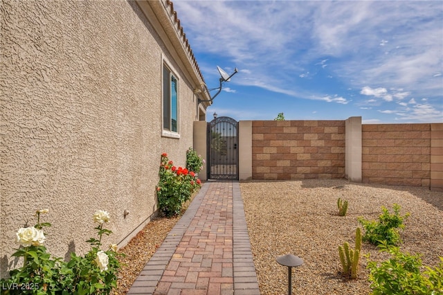 view of yard with a gate and fence