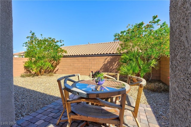 8036 Literature Ct, Las Vegas, NV 89113 - view of patio / terrace with a fenced backyard