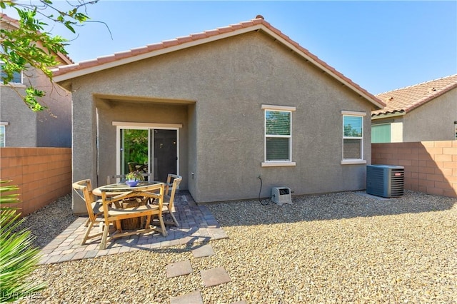 8036 Literature Ct, Las Vegas, NV 89113 - back of property with fence, cooling unit, and stucco siding