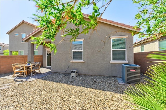 8036 Literature Ct, Las Vegas, NV 89113 - rear view of house featuring fence, a patio, cooling unit, and stucco siding