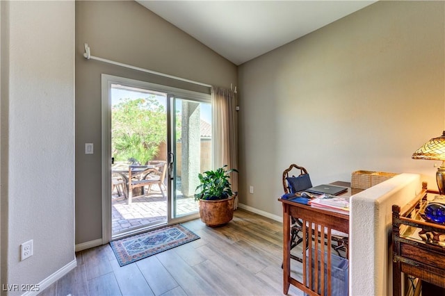 8036 Literature Ct, Las Vegas, NV 89113 - entryway featuring lofted ceiling, baseboards, and wood finished floors