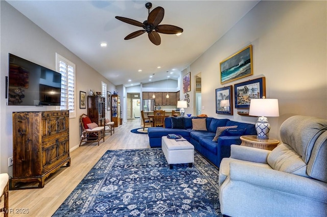 8036 Literature Ct, Las Vegas, NV 89113 - living area featuring recessed lighting, vaulted ceiling, baseboards, light wood-style flooring, and ceiling fan