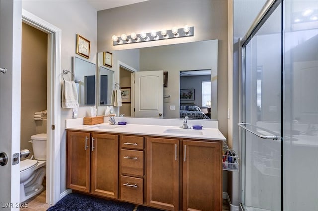 8036 Literature Ct, Las Vegas, NV 89113 - ensuite bathroom with ensuite bath, toilet, a stall shower, and a sink