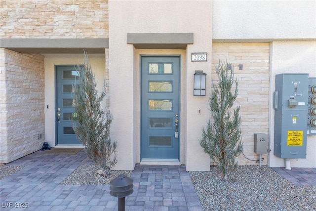 600 N Carriage Hill Dr Unit 2098, Las Vegas, NV 89138 - doorway to property featuring stucco siding