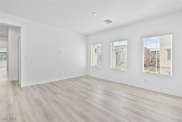 600 N Carriage Hill Dr Unit 2098, Las Vegas, NV 89138 - unfurnished room with baseboards, visible vents, and light wood-type flooring