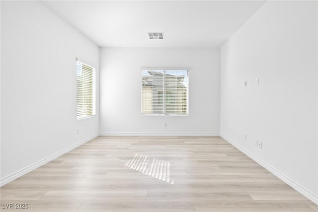 600 N Carriage Hill Dr Unit 2098, Las Vegas, NV 89138 - spare room with light wood-type flooring, baseboards, and visible vents