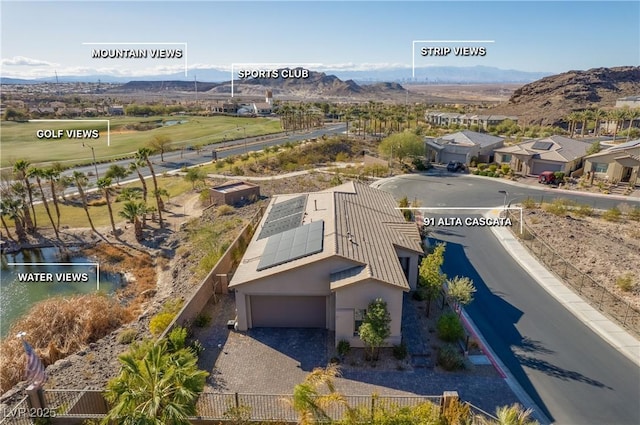 drone / aerial view featuring a mountain view