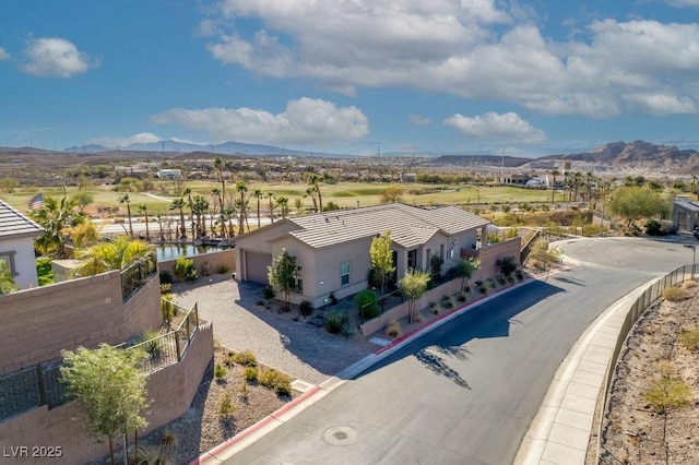 drone / aerial view featuring a mountain view