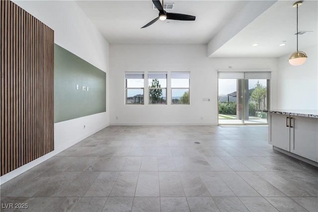 91 Alta Cascata Pl, Henderson, NV 89011 - unfurnished living room with ceiling fan, light tile patterned floors, and visible vents