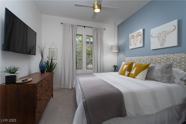 bedroom featuring carpet floors, baseboards, and ceiling fan