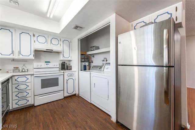 4687 Monterey Cir Unit 1, Las Vegas, NV 89169 - kitchen with washer and clothes dryer, light countertops, visible vents, freestanding refrigerator, and white range with electric cooktop