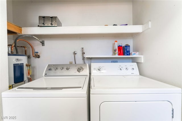 4687 Monterey Cir Unit 1, Las Vegas, NV 89169 - washroom featuring electric water heater, independent washer and dryer, and laundry area