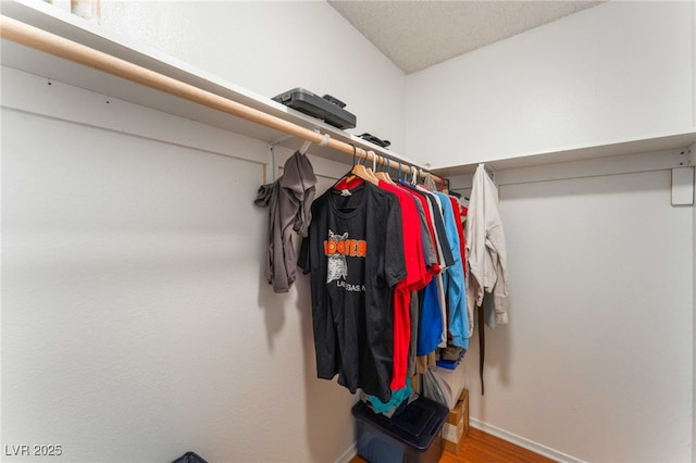 4687 Monterey Cir Unit 1, Las Vegas, NV 89169 - spacious closet featuring wood finished floors