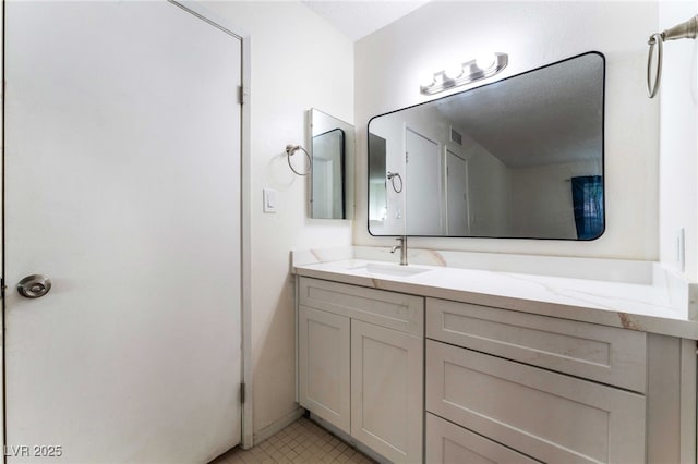 4687 Monterey Cir Unit 1, Las Vegas, NV 89169 - bathroom featuring vanity and tile patterned flooring