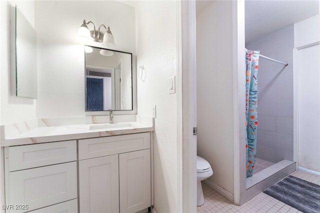 4687 Monterey Cir Unit 1, Las Vegas, NV 89169 - bathroom with tile patterned floors, vanity, a shower stall, and toilet
