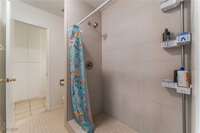 4687 Monterey Cir Unit 1, Las Vegas, NV 89169 - full bathroom featuring a tile shower and tile patterned floors