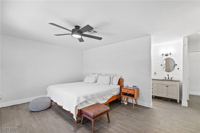 4298 Cartegena Way, Las Vegas, NV 89121 - bedroom with wood finished floors, visible vents, baseboards, and ceiling fan