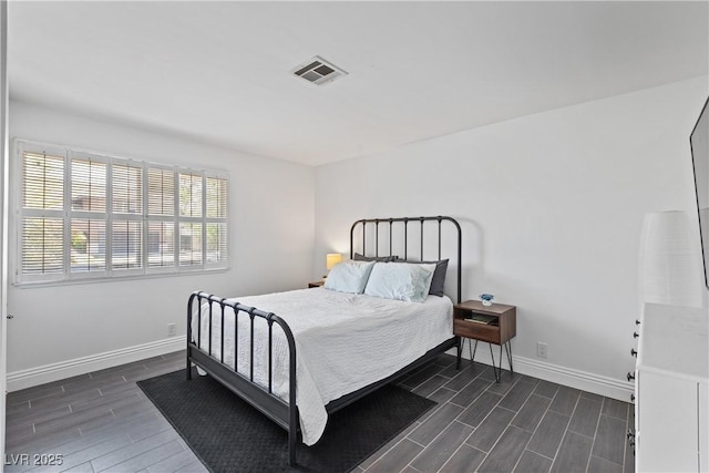 4298 Cartegena Way, Las Vegas, NV 89121 - bedroom featuring wood tiled floor, visible vents, and baseboards