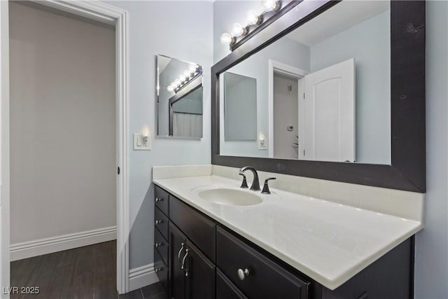 4298 Cartegena Way, Las Vegas, NV 89121 - bathroom featuring wood finished floors, baseboards, and vanity