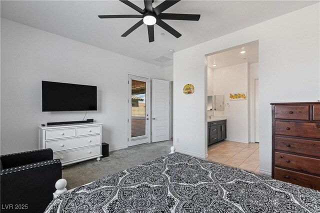 713 Webber Park St, Henderson, NV 89011 - bedroom with light carpet, visible vents, baseboards, ceiling fan, and ensuite bath