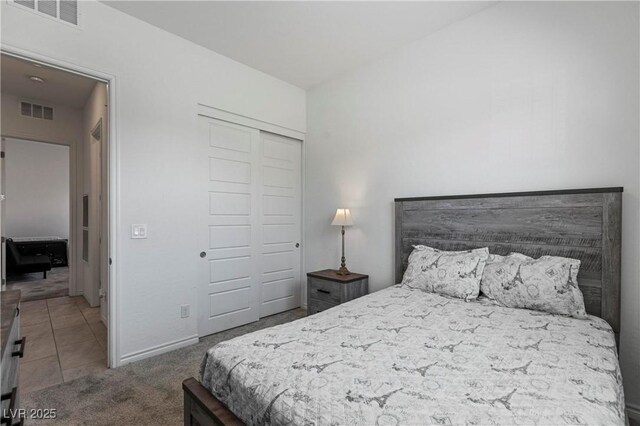 713 Webber Park St, Henderson, NV 89011 - bedroom featuring baseboards, carpet floors, visible vents, and a closet