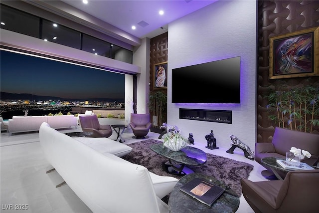 661 Dragon Peak Dr, Henderson, NV 89012 - living room with recessed lighting and a glass covered fireplace