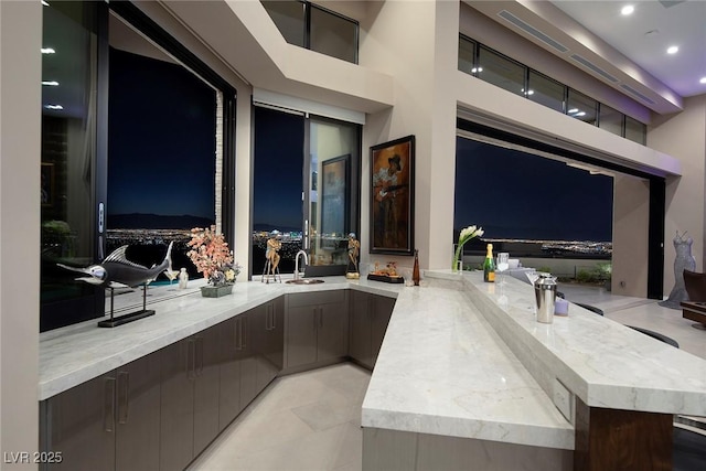 661 Dragon Peak Dr, Henderson, NV 89012 - view of patio featuring a sink and outdoor wet bar