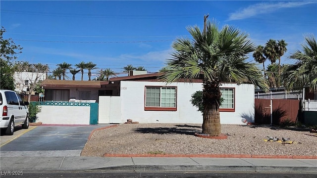 view of front of property with fence
