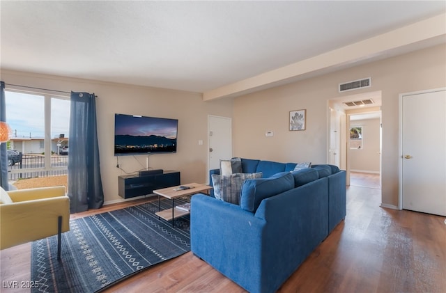 1615 Palora Ave, Las Vegas, NV 89169 - living area featuring healthy amount of natural light and wood finished floors