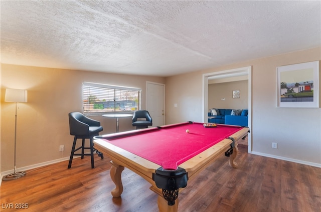 1615 Palora Ave, Las Vegas, NV 89169 - game room with a textured ceiling, wood finished floors, pool table, and baseboards