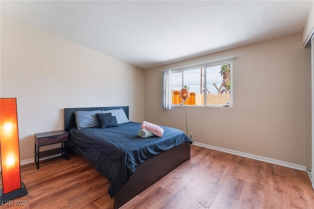 1615 Palora Ave, Las Vegas, NV 89169 - bedroom featuring wood finished floors and baseboards