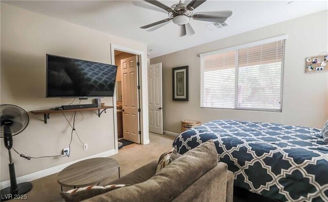 bedroom featuring baseboards, visible vents, carpet floors, and ceiling fan