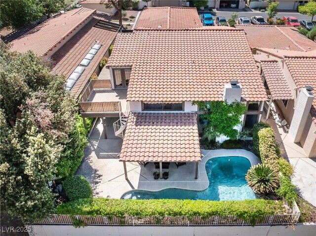 view from above of property with a pool area