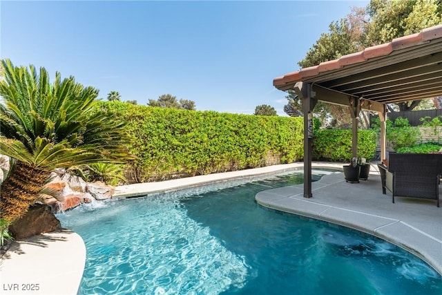view of pool with a patio area and a fenced backyard