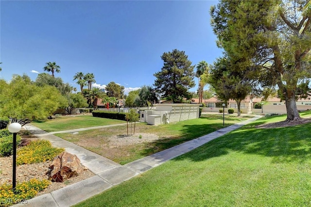 surrounding community with a yard